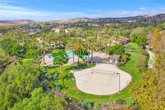 birds eye view of property with a mountain view