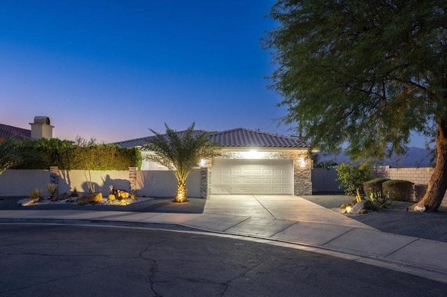 view of front of house with a garage