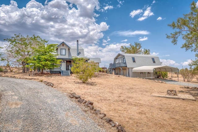 view of front of house with a carport