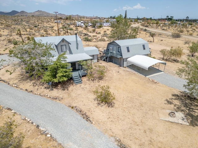 drone / aerial view featuring a mountain view