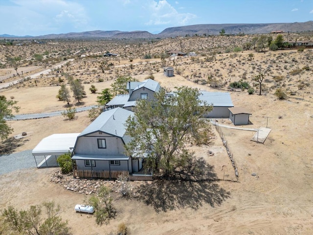 drone / aerial view featuring a mountain view