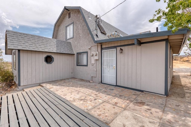 deck with a patio