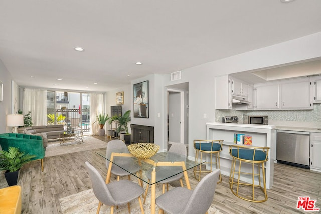 dining area featuring light hardwood / wood-style floors