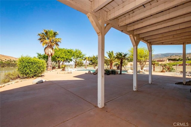 view of patio with a mountain view