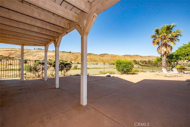 view of patio featuring a mountain view