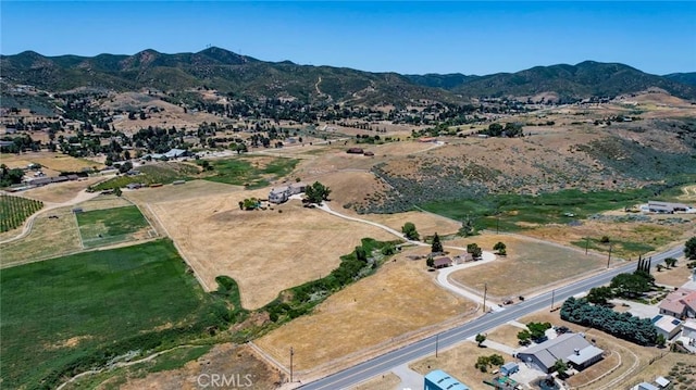 drone / aerial view featuring a mountain view