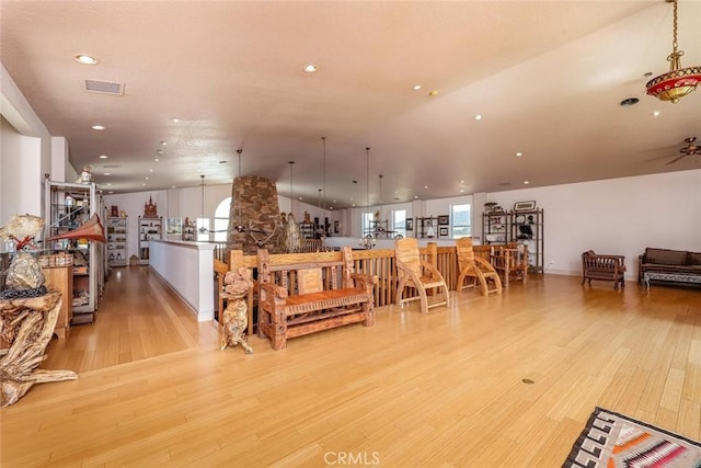 living room with light hardwood / wood-style flooring