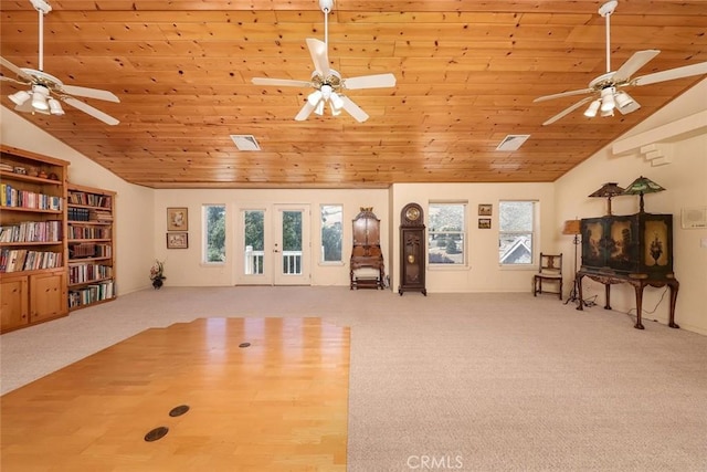 workout room featuring carpet, wooden ceiling, and visible vents