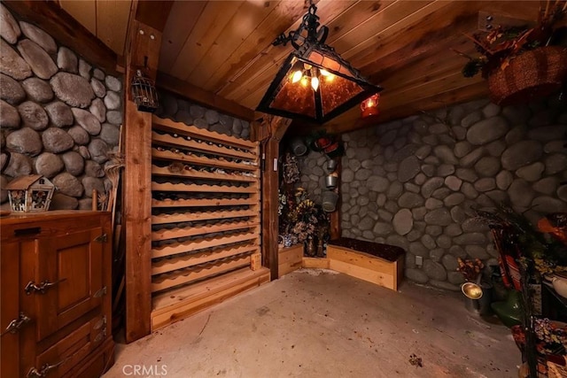 wine room featuring wood ceiling