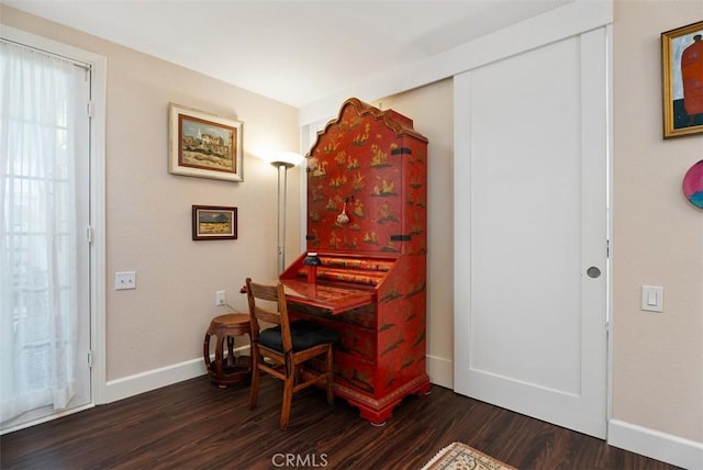 misc room with dark hardwood / wood-style flooring