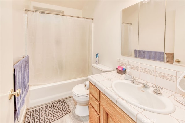 full bathroom with toilet, vanity, decorative backsplash, and shower / bathtub combination with curtain