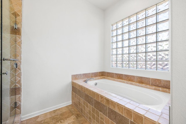 bathroom with a shower with shower door