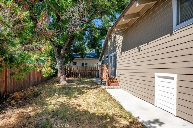 view of yard featuring fence