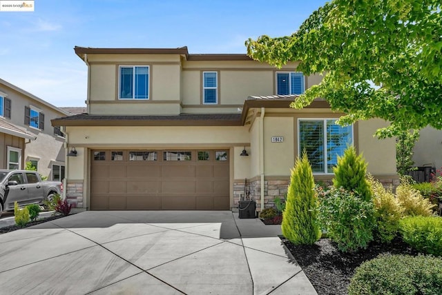 view of front of home with a garage