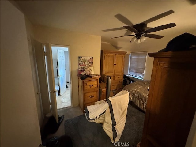 bedroom with concrete flooring and ceiling fan