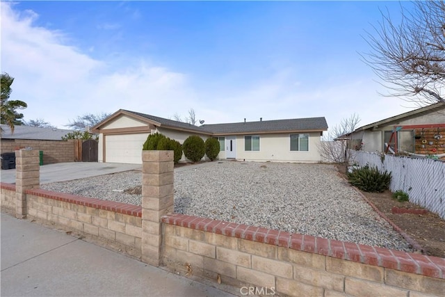 single story home featuring a garage