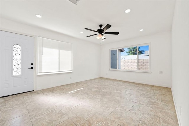 foyer featuring ceiling fan