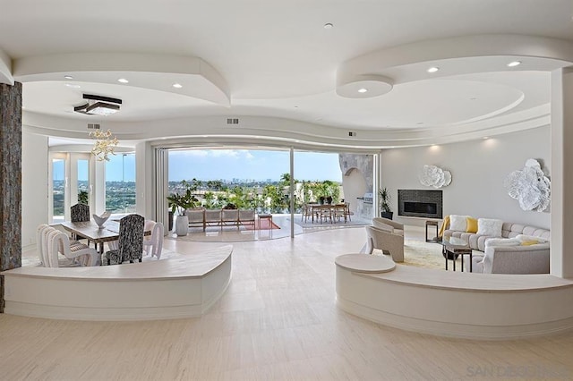 living room with an inviting chandelier