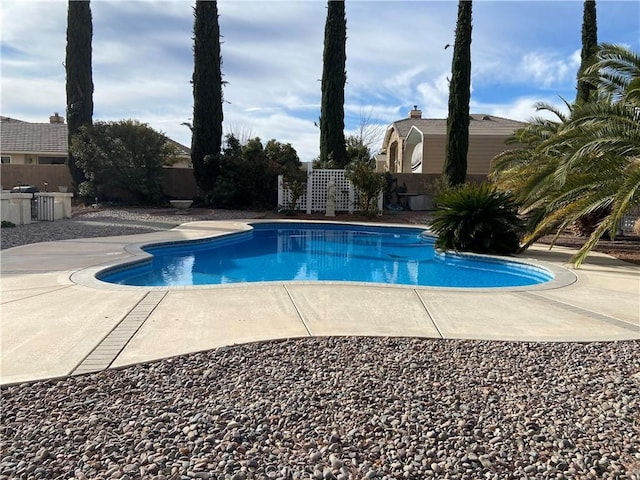 view of pool with a patio, a fenced backyard, and a fenced in pool