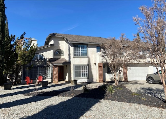 front of property featuring a garage