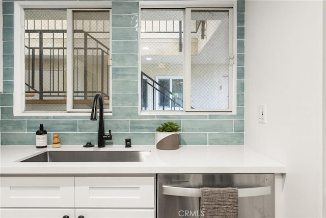 bathroom featuring backsplash and vanity