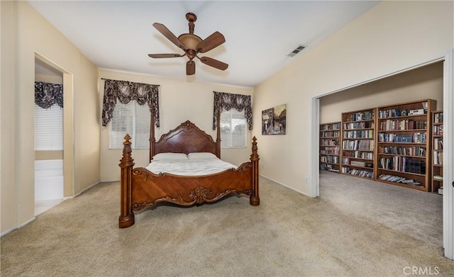 carpeted bedroom with ceiling fan