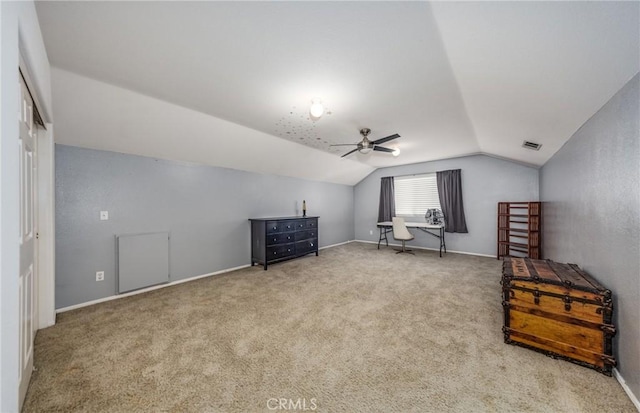 bonus room featuring ceiling fan, carpet flooring, and lofted ceiling