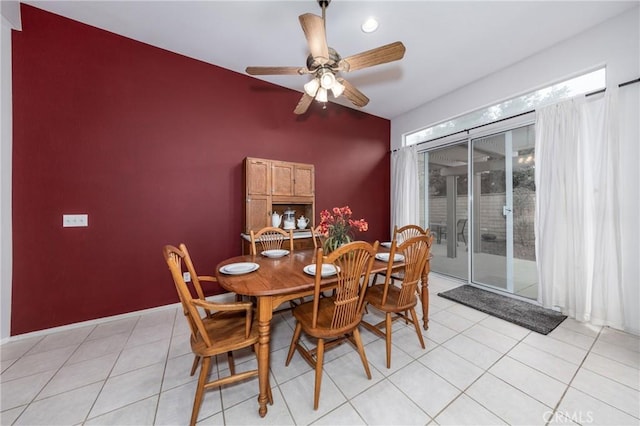 dining room featuring ceiling fan and vaulted ceiling