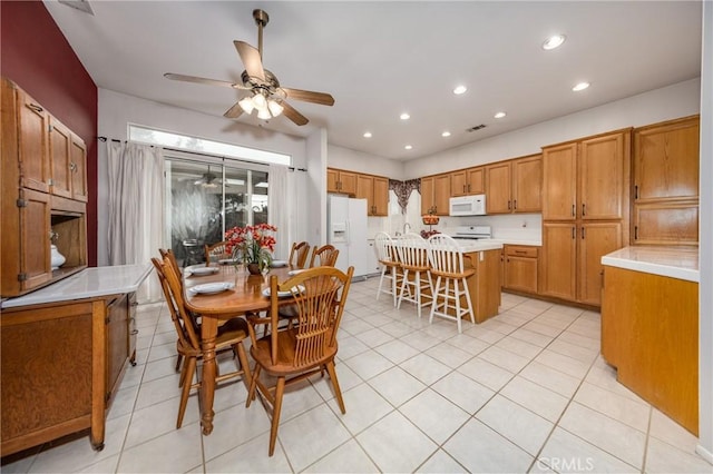 dining area featuring ceiling fan