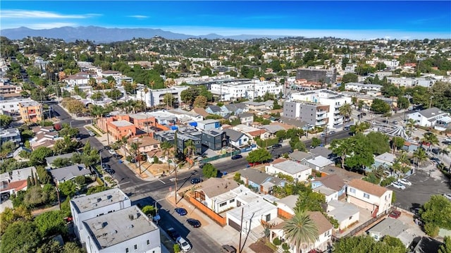 bird's eye view with a residential view and a mountain view