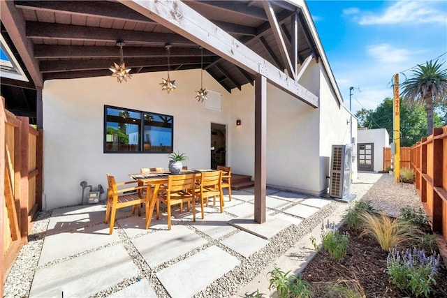 view of patio / terrace featuring outdoor dining space and a fenced backyard