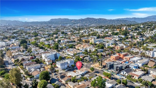 birds eye view of property featuring a residential view and a mountain view