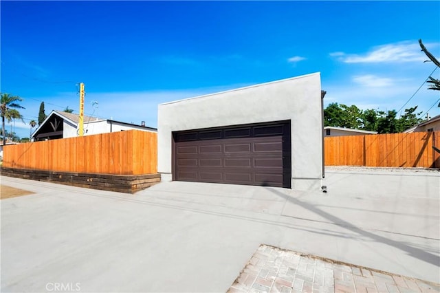 detached garage with fence