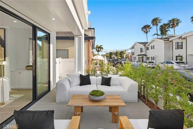 balcony featuring a patio area and outdoor lounge area