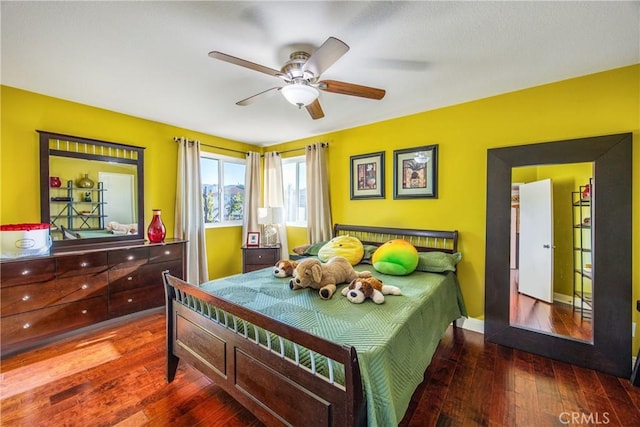 bedroom featuring ceiling fan and hardwood / wood-style floors