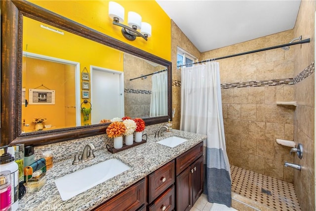 bathroom featuring vanity and a shower with curtain