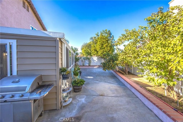 view of patio / terrace with a grill