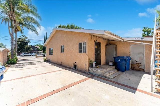 exterior space with a patio