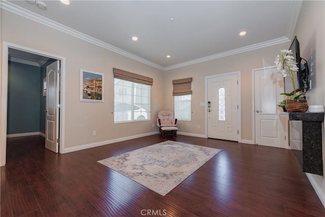 entryway featuring crown molding and dark hardwood / wood-style floors