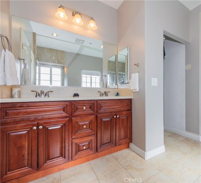 bathroom featuring tile patterned floors and vanity