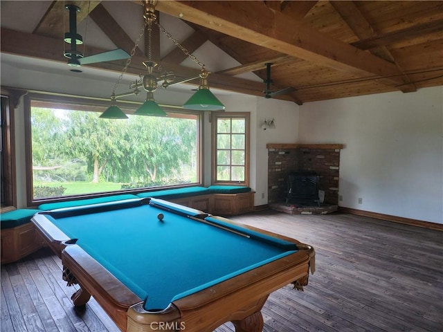 rec room featuring dark hardwood / wood-style floors, vaulted ceiling with beams, a wood stove, pool table, and wooden ceiling