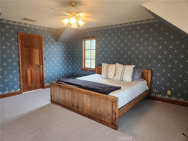 bedroom with ceiling fan and carpet flooring