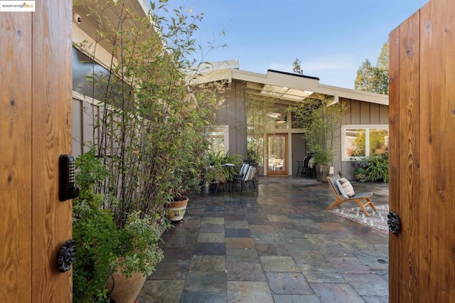 property entrance with a patio