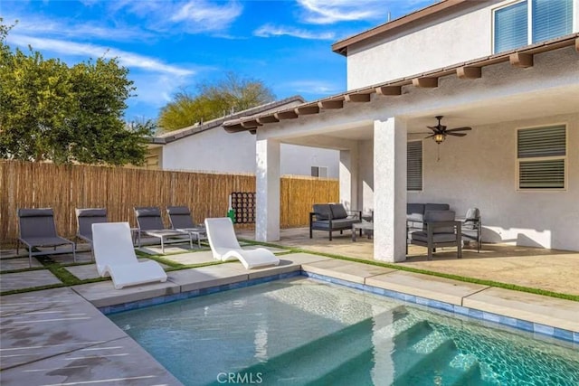 exterior space featuring ceiling fan, a fenced in pool, an outdoor hangout area, and a patio