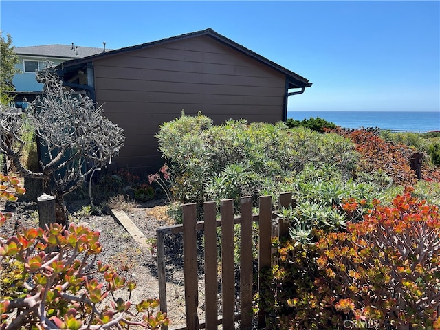 view of side of property with a water view