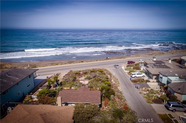 bird's eye view with a water view and a view of the beach