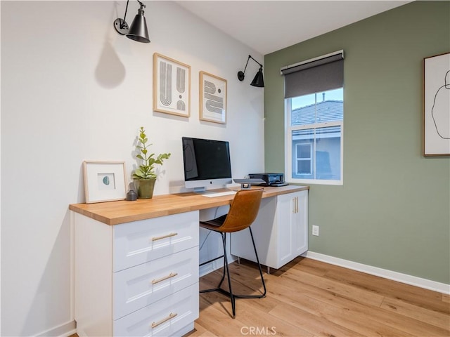 office space with light hardwood / wood-style flooring