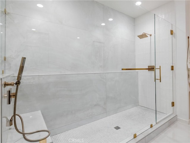 bathroom featuring tile patterned flooring and walk in shower