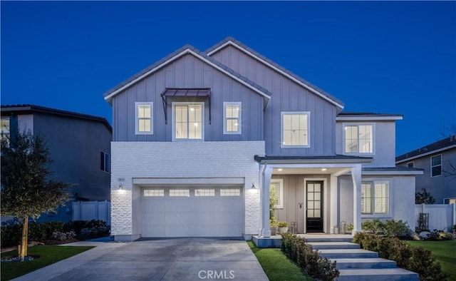 view of front of property featuring a garage