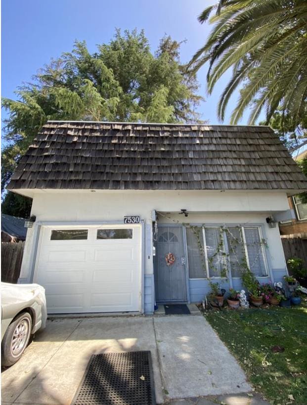 exterior space with a garage